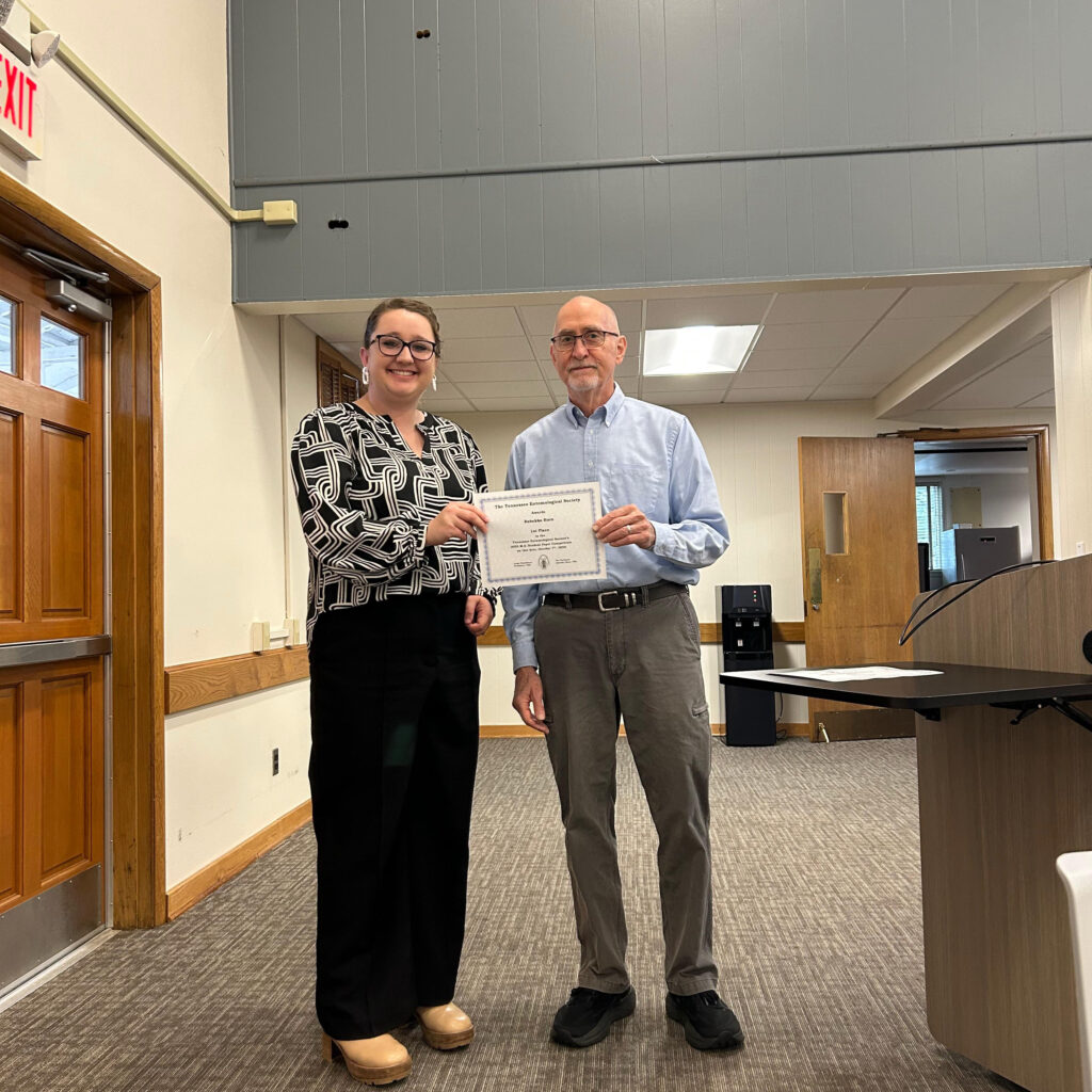 Rebekka Horn, UT, receiving first-place award from chair Pat Parkman