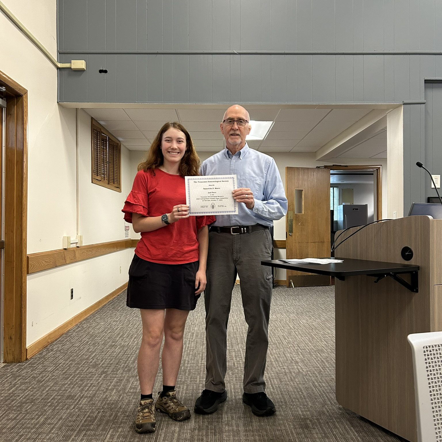Samantha Moore, University of the South, receiving 2nd place undergraduate award from chair Pat Parkman